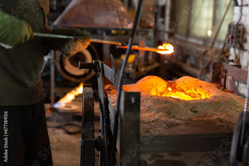 Foundry - ferrous metal is melted in an induction furnace of metallurgical plant