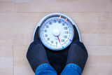 Scale shows person is overweight