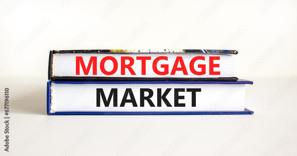 Mortgage market symbol. Concept words Mortgage market on beautiful books. Beautiful white table white background. Business mortgage market concept. Copy space.