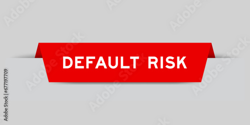 Red color inserted label with word default risk on gray background