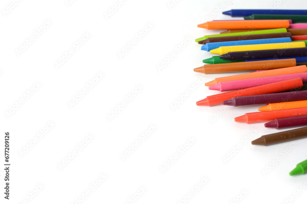 Crayons lined up isolated on white background. Crayons lined up isolated on white background.