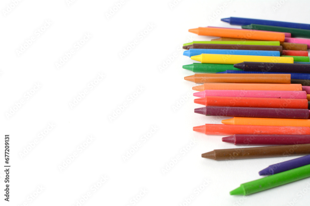 Crayons lined up isolated on white background. Crayons lined up isolated on white background.