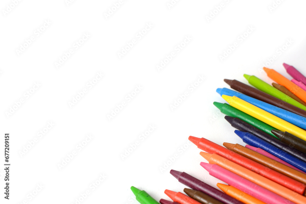 Crayons lined up isolated on white background. Crayons lined up isolated on white background.