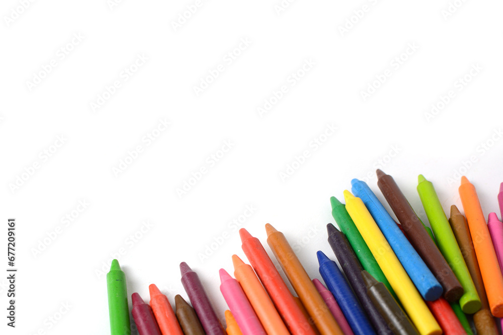 Crayons lined up isolated on white background. Crayons lined up isolated on white background.
