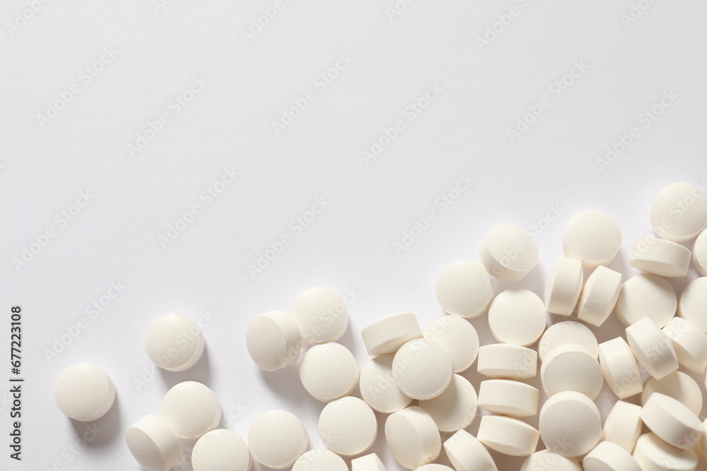 white pills on white background white pills on white background