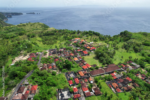 Aerial view of Tanglad village on sunny day. Nusa Penida Island, Indonesia. photo