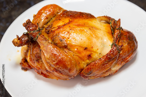 Traditional homemade roast chicken, stuffed with farofa