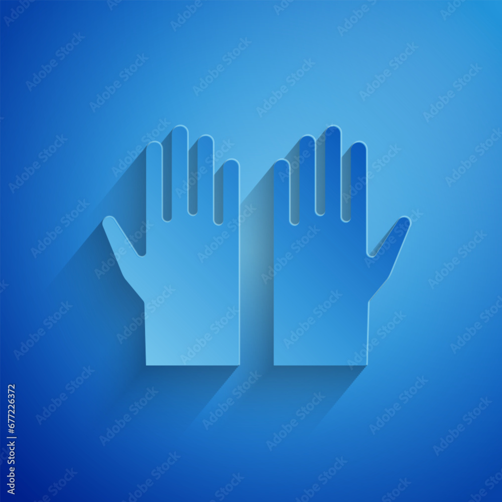 Paper cut Medical rubber gloves icon isolated on blue background. Protective rubber gloves. Paper art style. Vector Paper cut Medical rubber gloves icon isolated on blue background. Protective rubber gloves. Paper art style. Vector