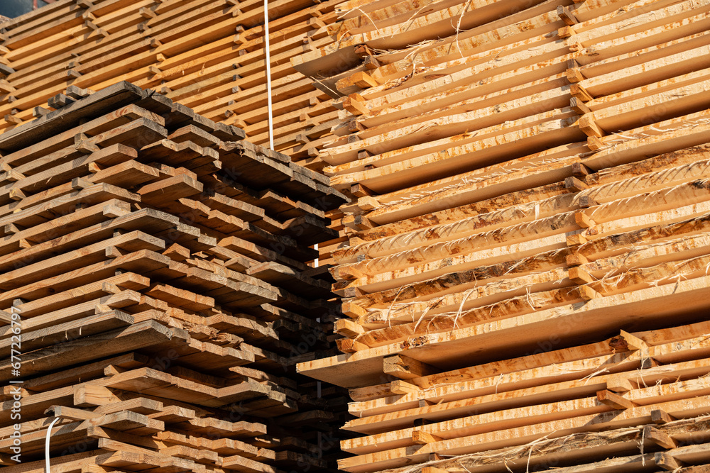 Storage of piles of wooden boards on the sawmill