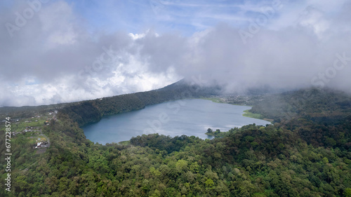 Drone view of Buyan Lake covered with clouds. Bali  Indonesia.