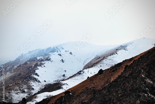 Mountains in Ala Archa National Park covered in snow, Bishkek, Kyrgyzstan photo