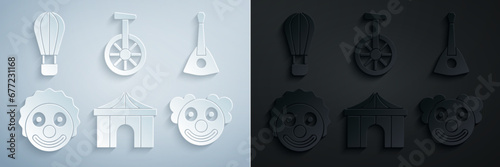 Set Circus tent, Balalaika, Clown head, Unicycle or one wheel bicycle and Hot air balloon icon. Vector