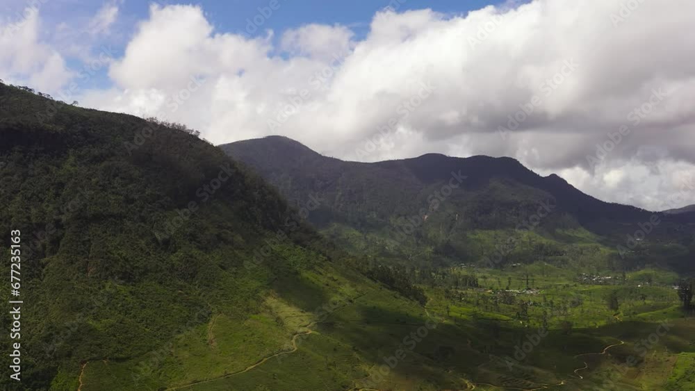 Aerial view of high mountain tea plantation. Tea estate in Maskeliya, Sri Lanka. Aerial view of high mountain tea plantation. Tea estate in Maskeliya, Sri Lanka.