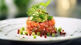 Tasty salmon tartare with avocado and greens on white table, closeup
