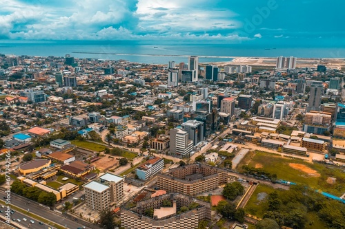 Aerial view of Lagos cityscape before the sea on a sunny day