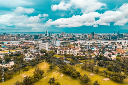 Aerial view of Lagos cityscape before the sea on a sunny day