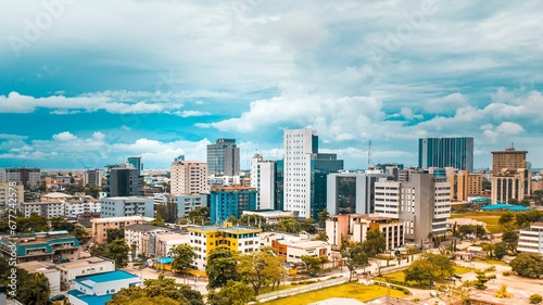 Aerial view of Lagos city urban buildings before the cloudy skyline on a sunny day