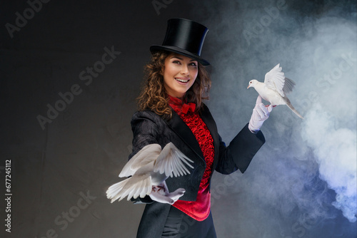 Konstfotografi A bewitching moment captured as a woman magician in a magician's costume and bla