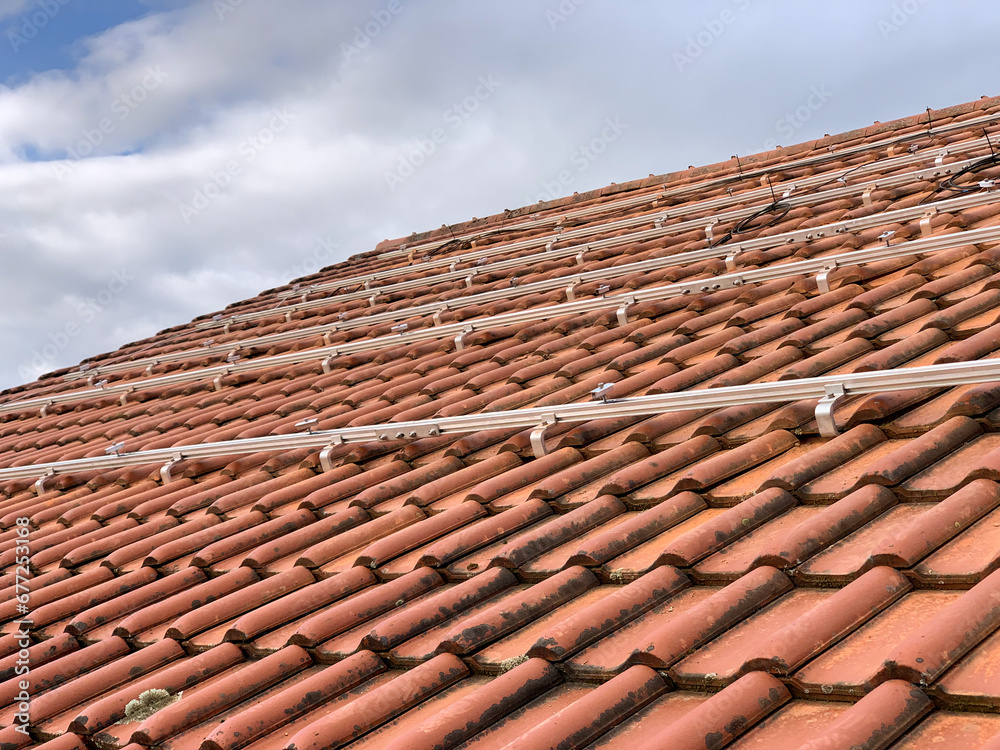 Profiles on the roof of a house for laying solar panels Profiles on the roof of a house for laying solar panels