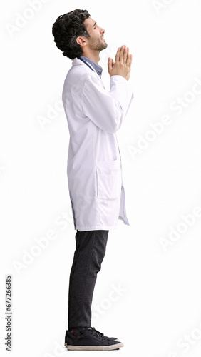 male doctor in a white coat on a white background in profile with his hands folded together © Katsiaryna