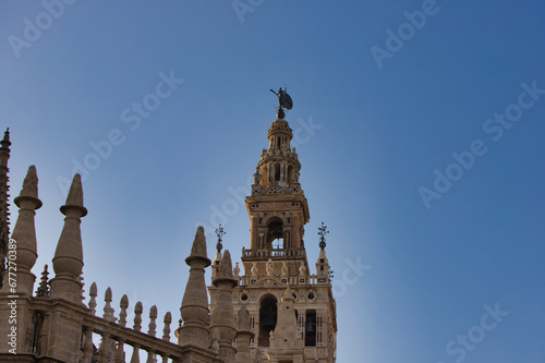 Cathedral of Santa Maria de la Sede with Giralda in Seville, Spain. Travel and tourism concept. Catholicism and monuments.