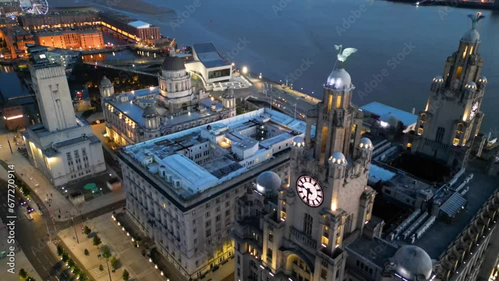 Three Graces buildings in Liverpool at night, England, UK (aerial view) Three Graces buildings in Liverpool at night, England, UK (aerial view)
