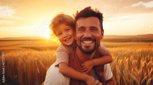 happy father farmer carries son child boy sunset. child sits happily his father shoulders wheat field photo