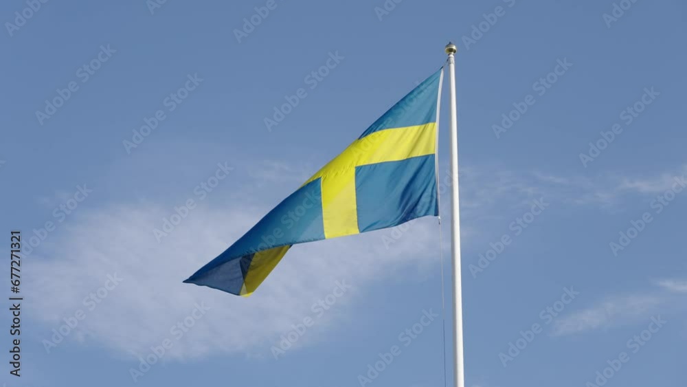 Sweden flag moving in wind. Sunny Swedish day Sweden flag moving in wind. Sunny Swedish day