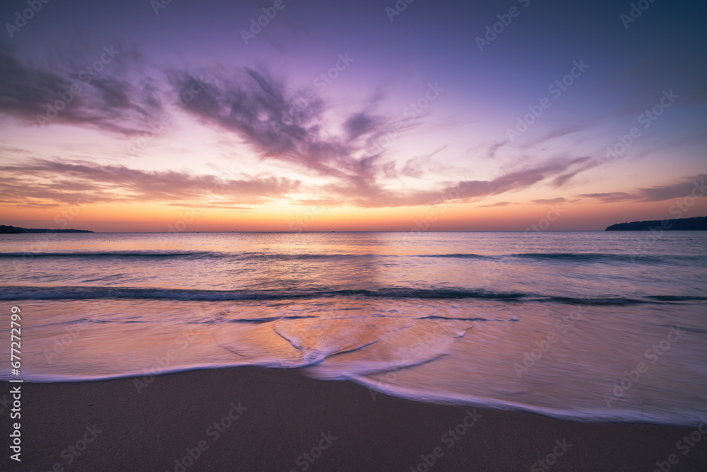 Beautiful cloudscape over the sea wave and beach, seascape at sunrise