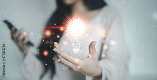 Innovation. Hands holding light bulb for Concept new idea concept with innovation and inspiration, innovative technology in science and communication concept.