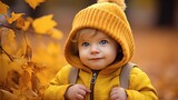 little baby in sunny autumn park