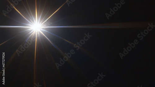 Lens flair as a graphic element isolated against a black background