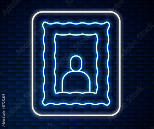 Glowing neon line Picture frame on table icon isolated on brick wall background. Valentines Day symbol. Vector