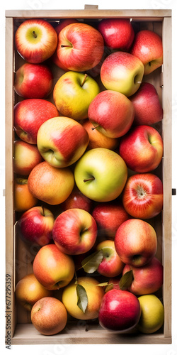 Ripe red and yellow apples in a wooden crate. top view