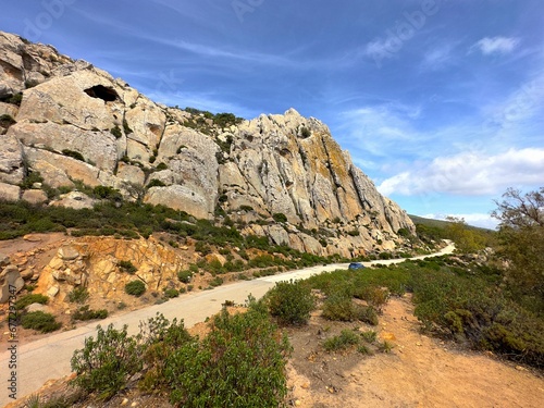 landscape in the mountains, rocks and Moorish Cave near Bolonia, Cueva del Moro, Andalusia, Spain 