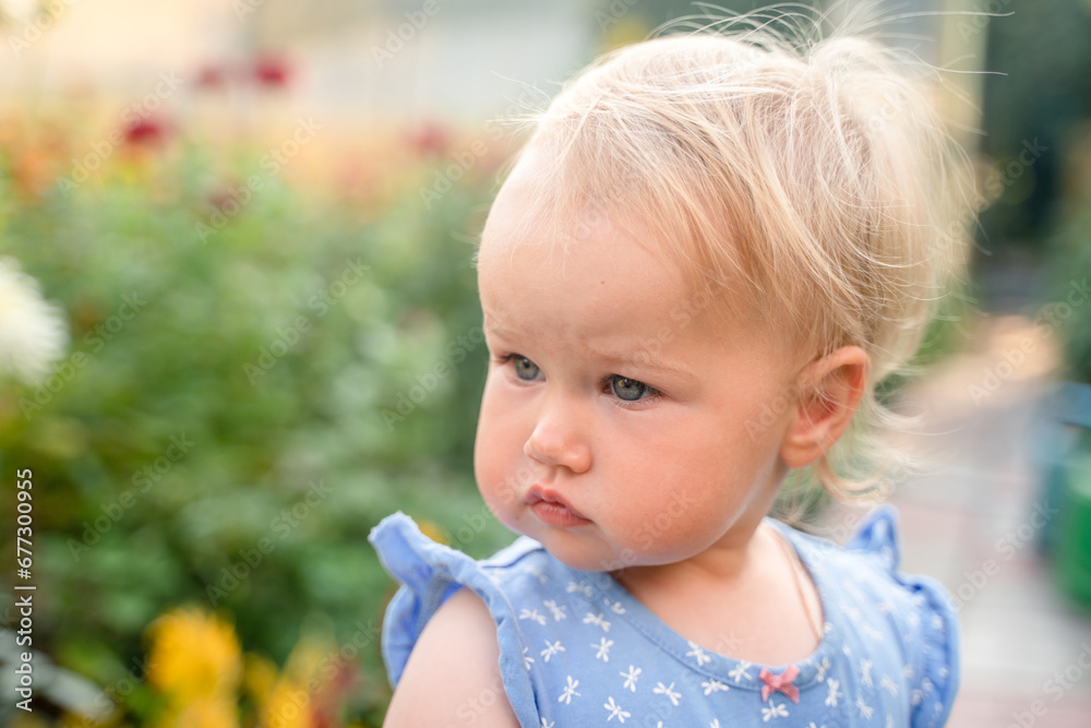 Portrait of a Caucasian baby child girl outside summer Portrait of a Caucasian baby child girl outside summer