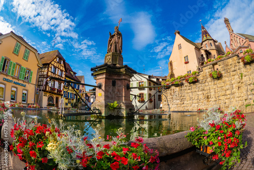 The beautiful colorful half timbered houses of  Alsace village Equisheim -  France  photo