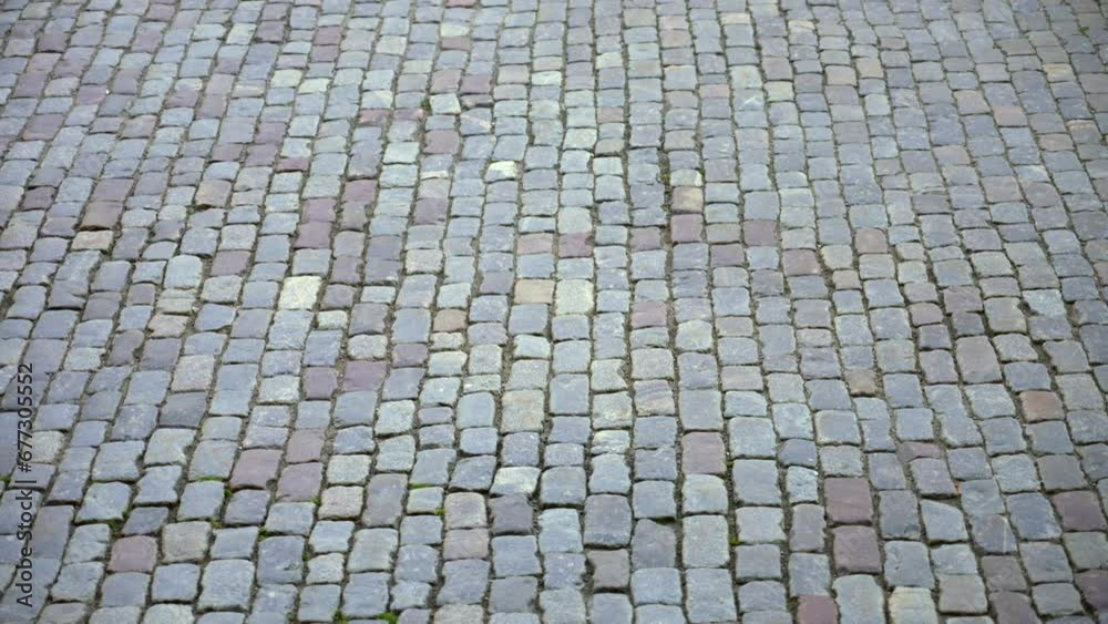Cobblestone street old traditional rubble pavement road in town stone pattern Cobblestone street old traditional rubble pavement road in town stone pattern