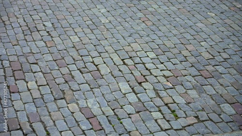 Old cobblestone street traditional  rubble pavement road in oldtown photo