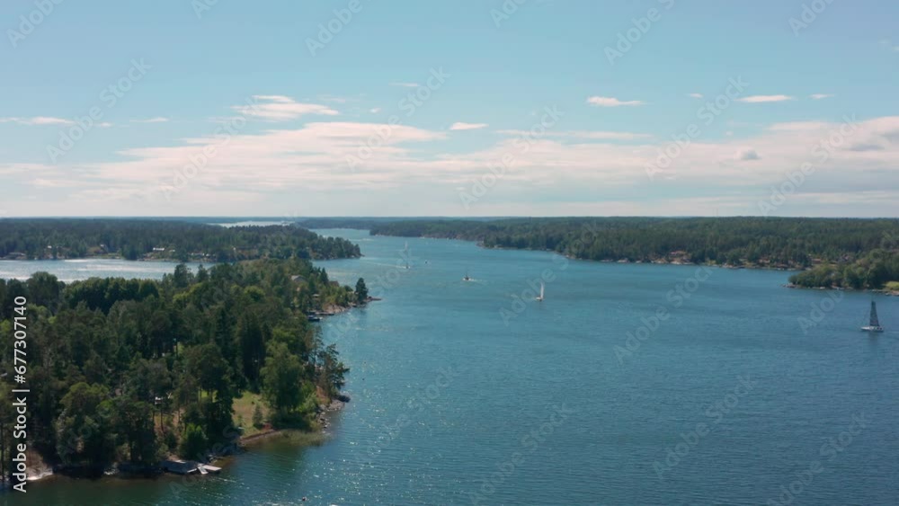 sailing boat and Small islands in Sweden archipelago Stockholm Baltic sea. Archipelago aerial view