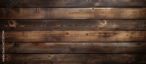 Aged dark reclaimed wood surface with lined up boards Wooden floor planks with grain and texture Copy space image Place for adding text or design