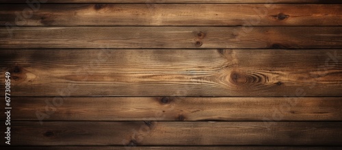 Aged dark reclaimed wood surface with lined up boards Wooden floor planks with grain and texture Copy space image Place for adding text or design photo