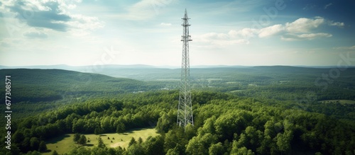 Bird s eye view of cellphone tower in rural West Virginia forest to show absence of broadband internet Copy space image Place for adding text or design photo