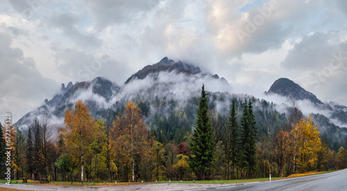 Cloudy and foggy autumn alpine mountain scene. Austrian Lienzer Dolomiten Alps. © wildman