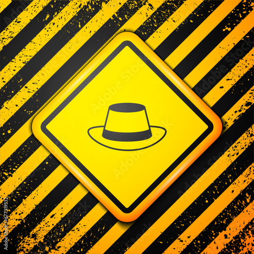 Black Oktoberfest hat icon isolated on yellow background. Hunter hat with feather. German hat. Warning sign. Vector