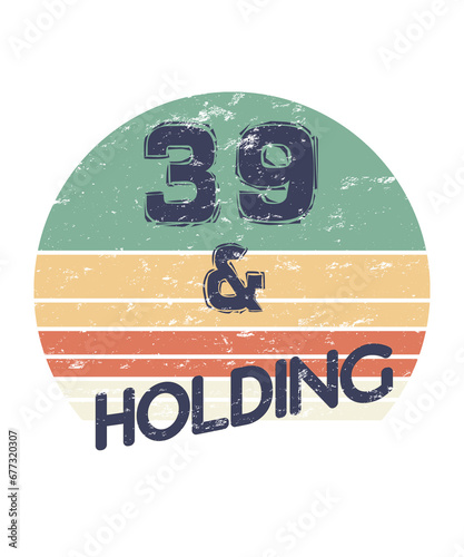 39 and holding for age 39 and 40 year olds who are refusing to grow older in a distressed vintage retro style on white background. (ID: 677320307)