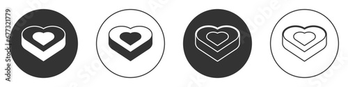 Black Candy in heart shaped box icon isolated on white background. Valentines Day. Circle button. Vector