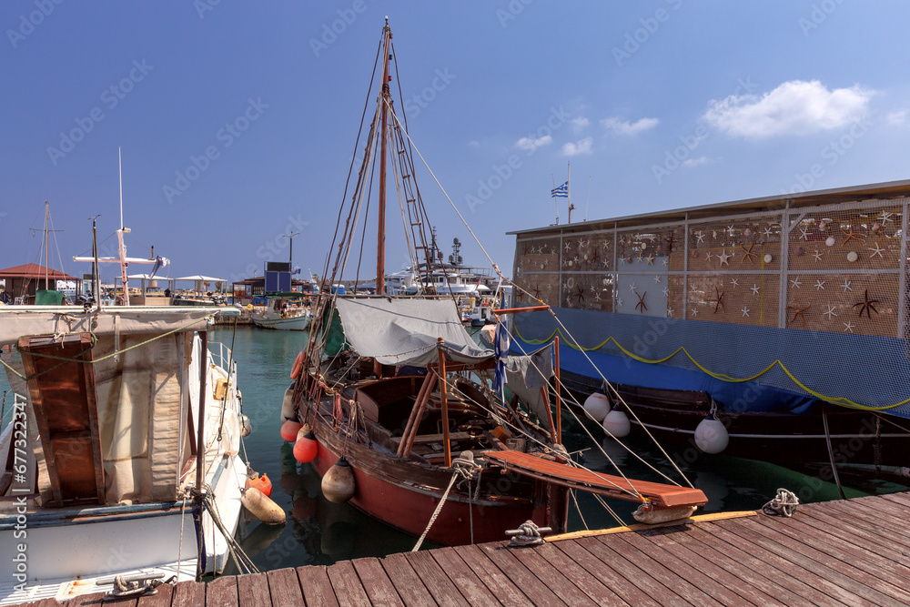 Traditional colorful fishing boats along the Rhodes waterfront.