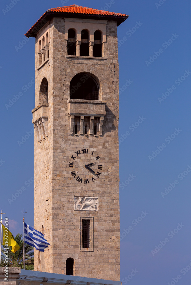 Tall Venetian tower in front of the old Orthodox Greek church in Rhodes.