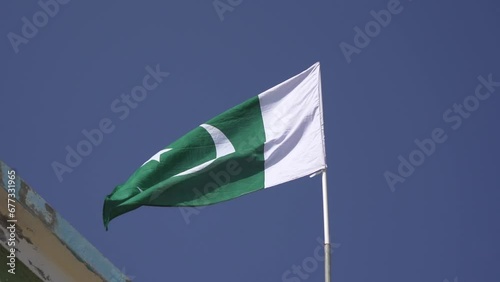 Pakistan flag waving. Recorded in slow motion. Green and white (ID: 677331965)